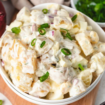 Potato salad with dill and green onions.