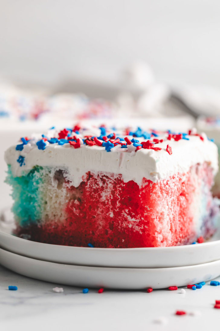 4th of july poke cake on a plate.