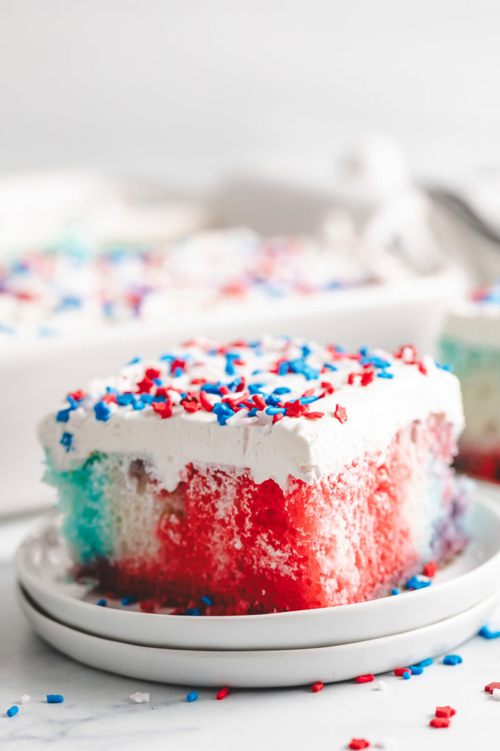 Red, white, and blue cake with sprinkles.