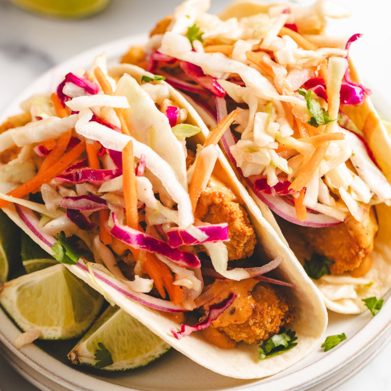 Two fish stick tacos with vinegar slaw.