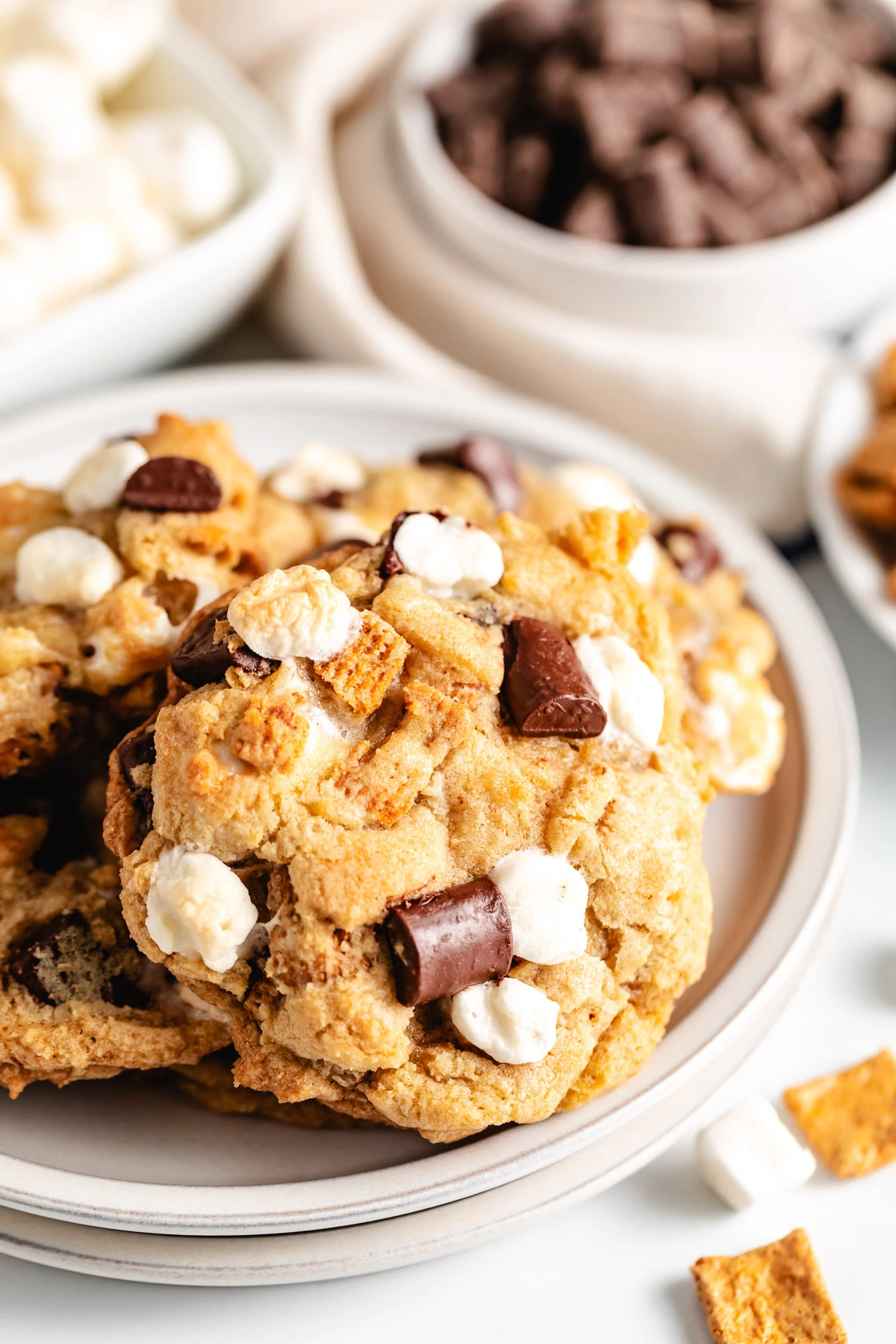 Plate of s'mores cookies with marshmallows.