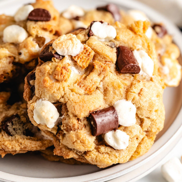 Plate of cookies with chocolate and marshmallows.