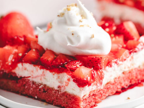 Strawberry layered dessert on a plate.