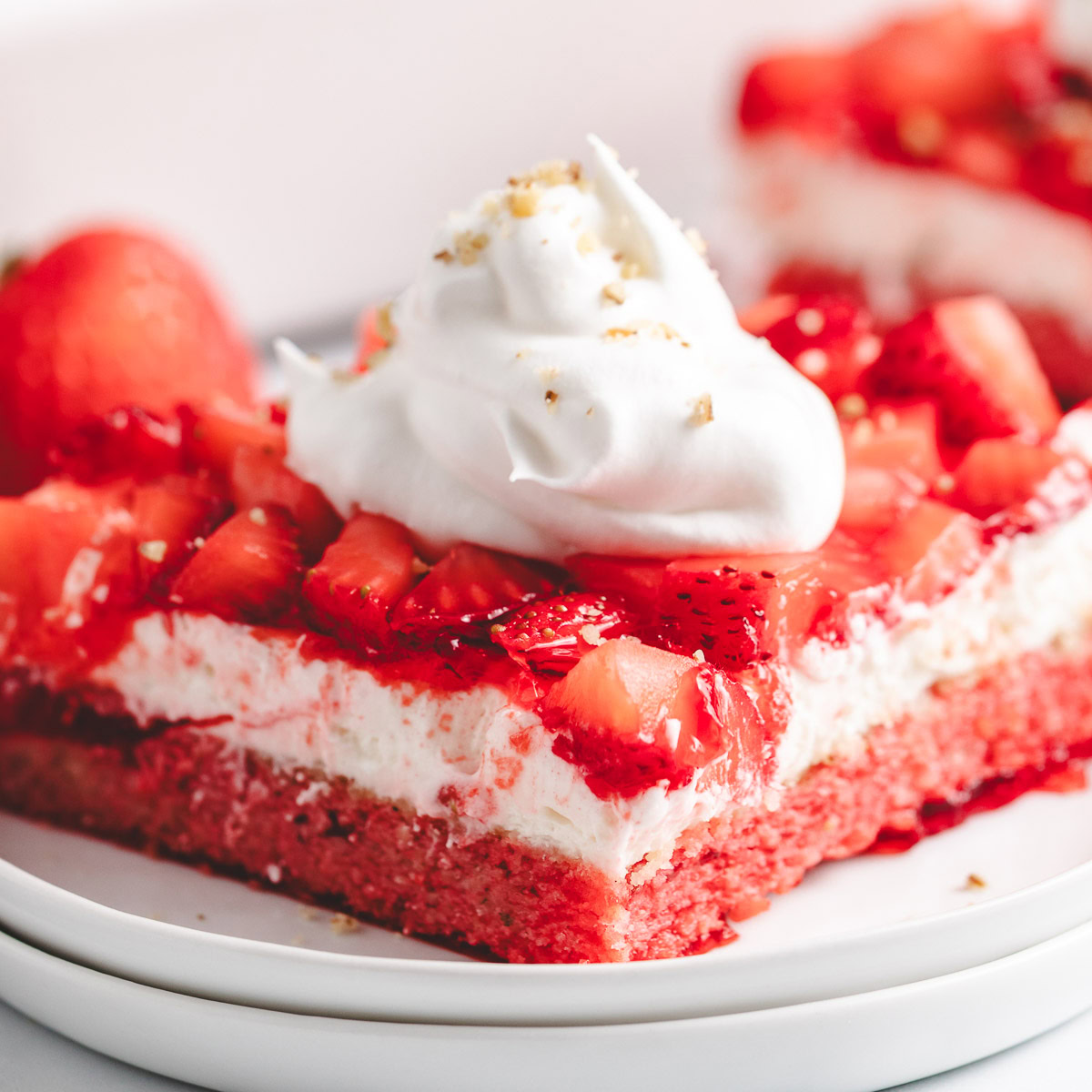 Strawberry layered dessert on a plate.