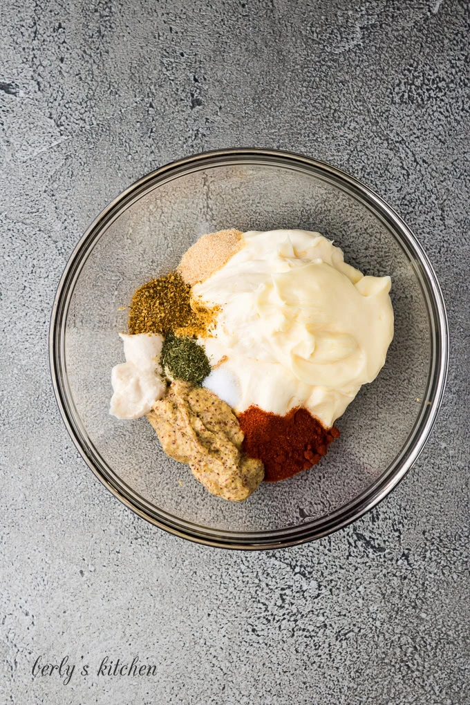 Ingredients for remoulade in a glass bowl.