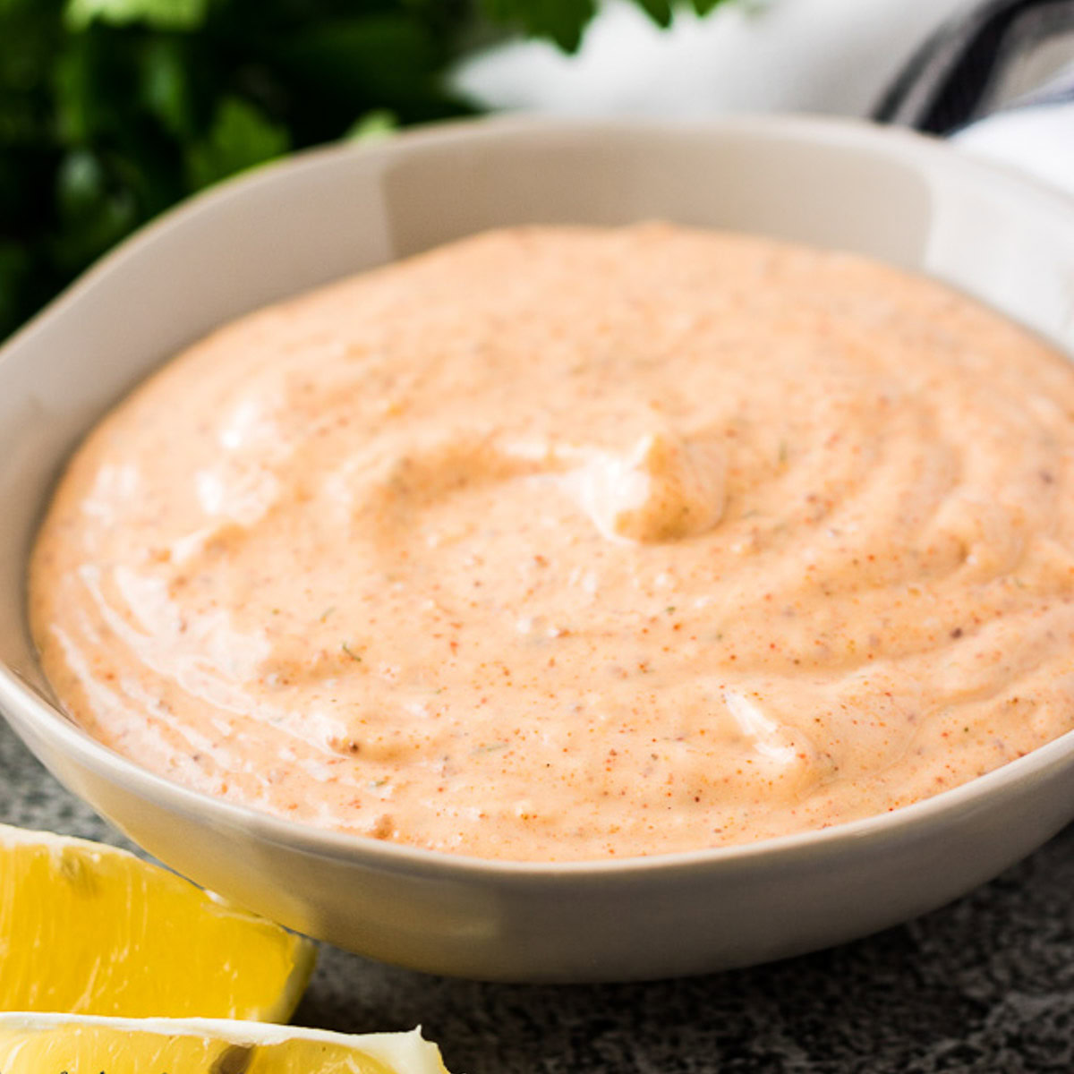 Close up view of a bowl of remoulade sauce.