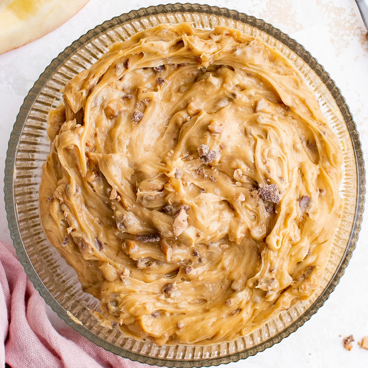 Close up view of toffee apple dip in a bowl.