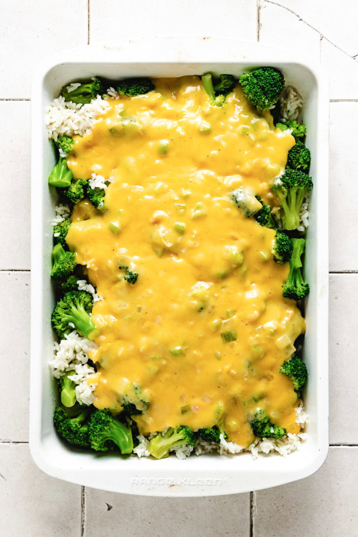 Cheesy soup mixture poured over broccoli and rice.