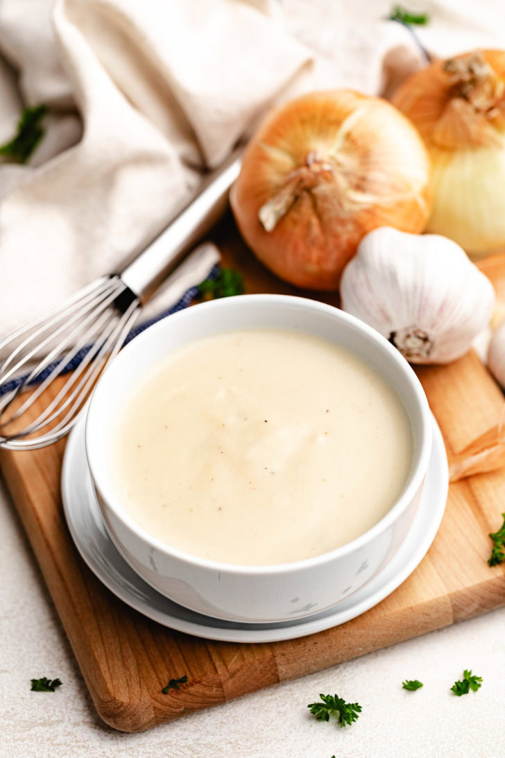 Substitute For Cream Of Chicken Soup White bowl filled with cream of chicken soup substitute.