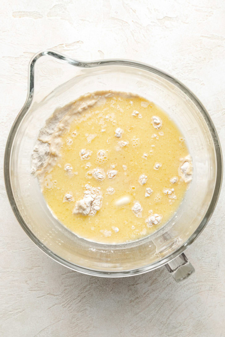 Ingredients for cinnamon roll dough in a bowl.