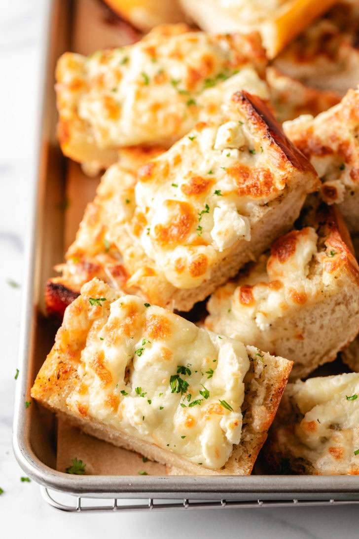 Feta garlic bread with parsley.