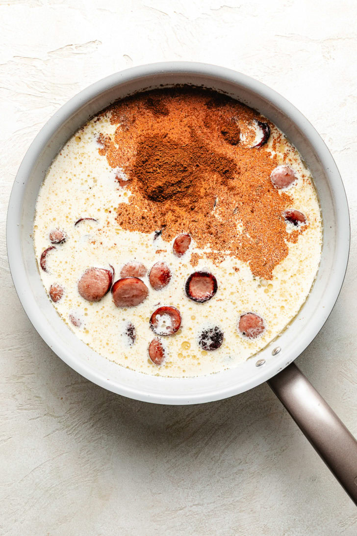 Cajun seasoning added to cream and sausage.