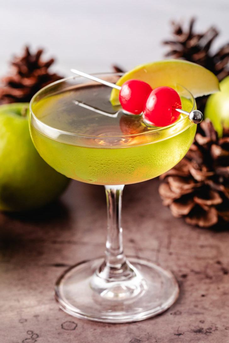 4&Ndash;Ingredient Sour Apple Martini Cherries on a sour apple martini.