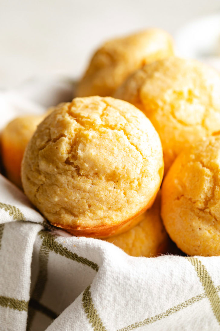 Freshly baked cornbread on a towel.