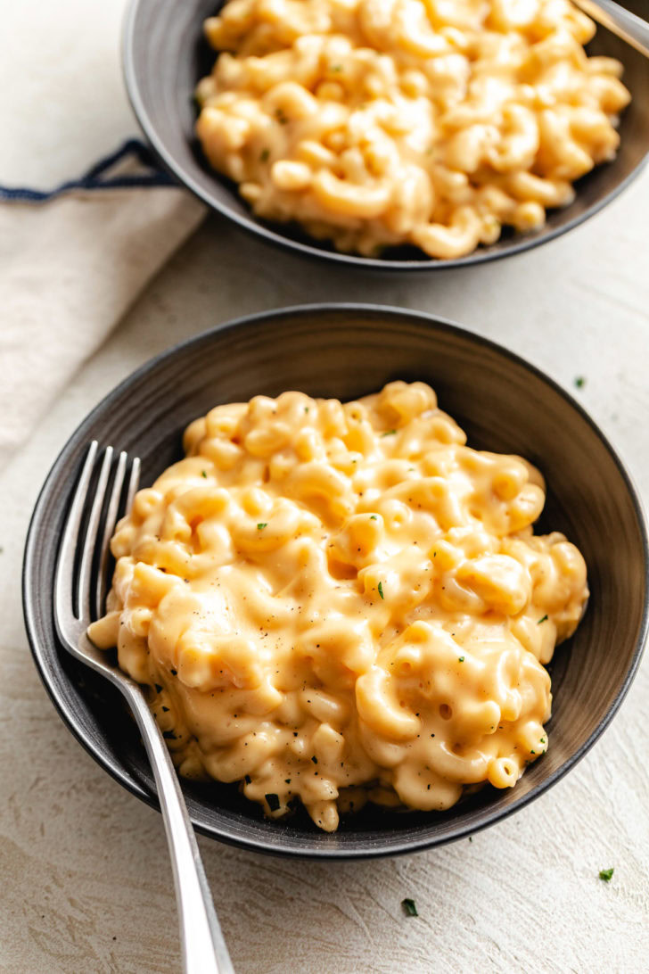 Overhead view of macaroni and cheese with a fork.