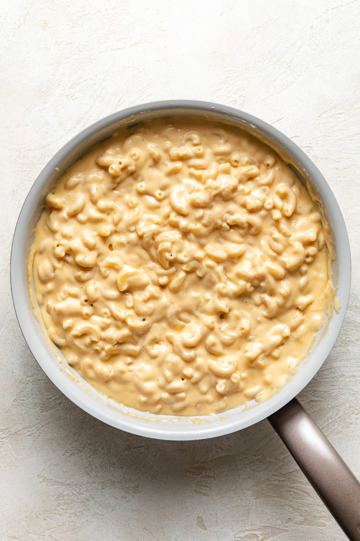 Macaroni and cheese in a skillet.
