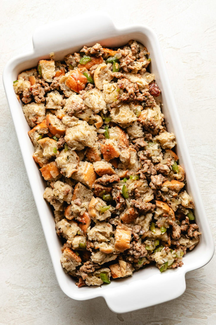 Classic Sausage Stuffing Unbaked stuffing in a pan.