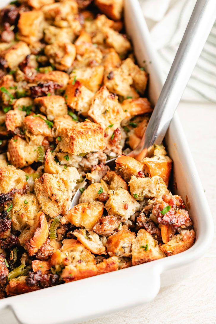 Classic Sausage Stuffing French bread sausage stuffing in a pan.