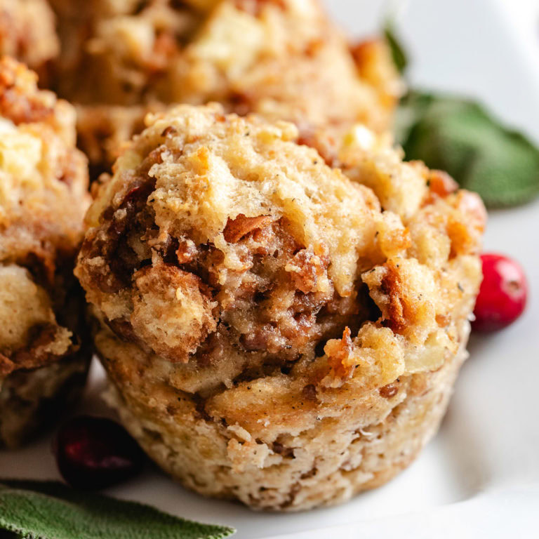 Close up view of stuffing muffin.