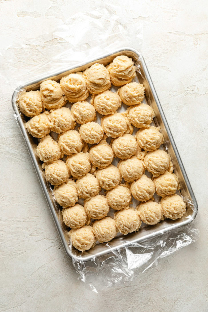 Tray of unbaked sugar cookie dough.