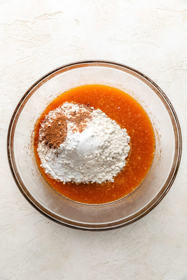 Flour and seasonings added to wet ingredients.