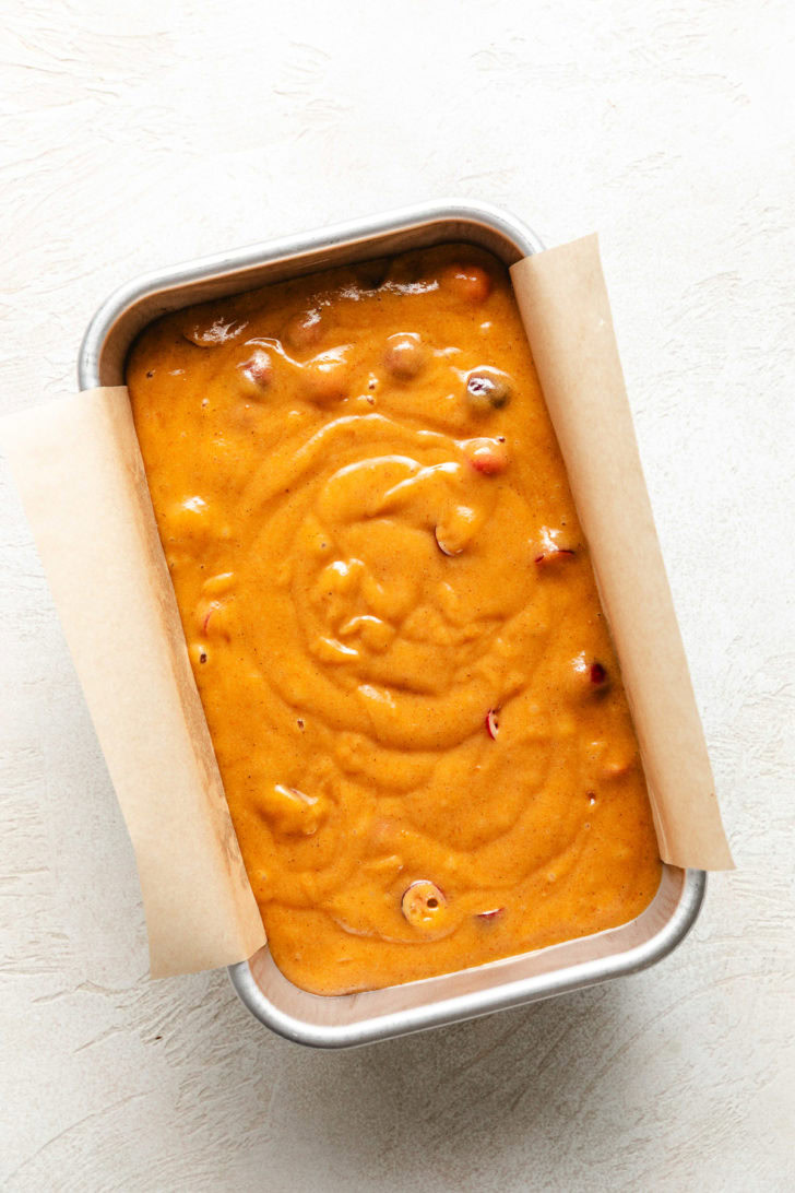 Pumpkin bread batter in a pan.