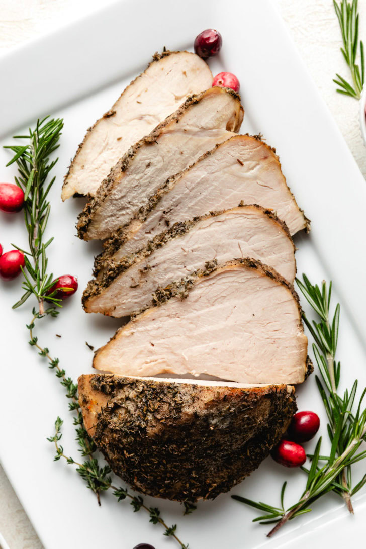 Overhead view of a sliced turkey breast.