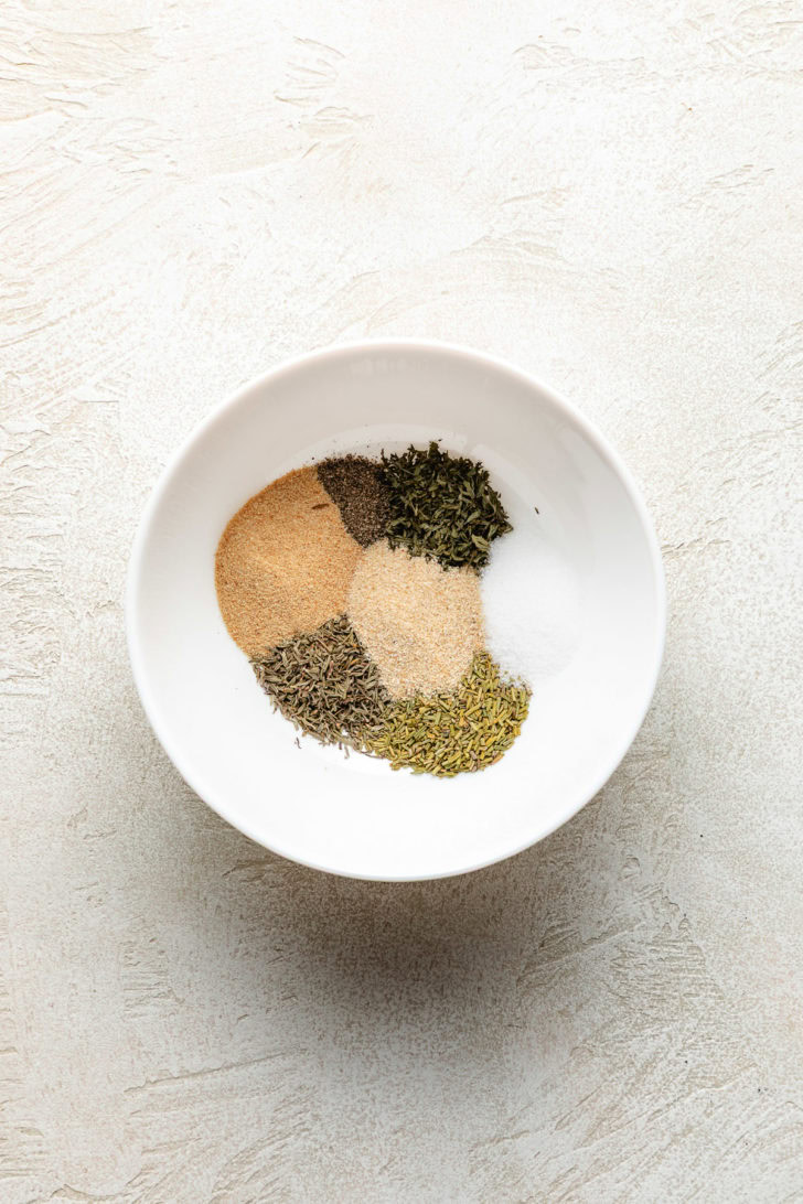 Mix of dried herbs in a bowl.
