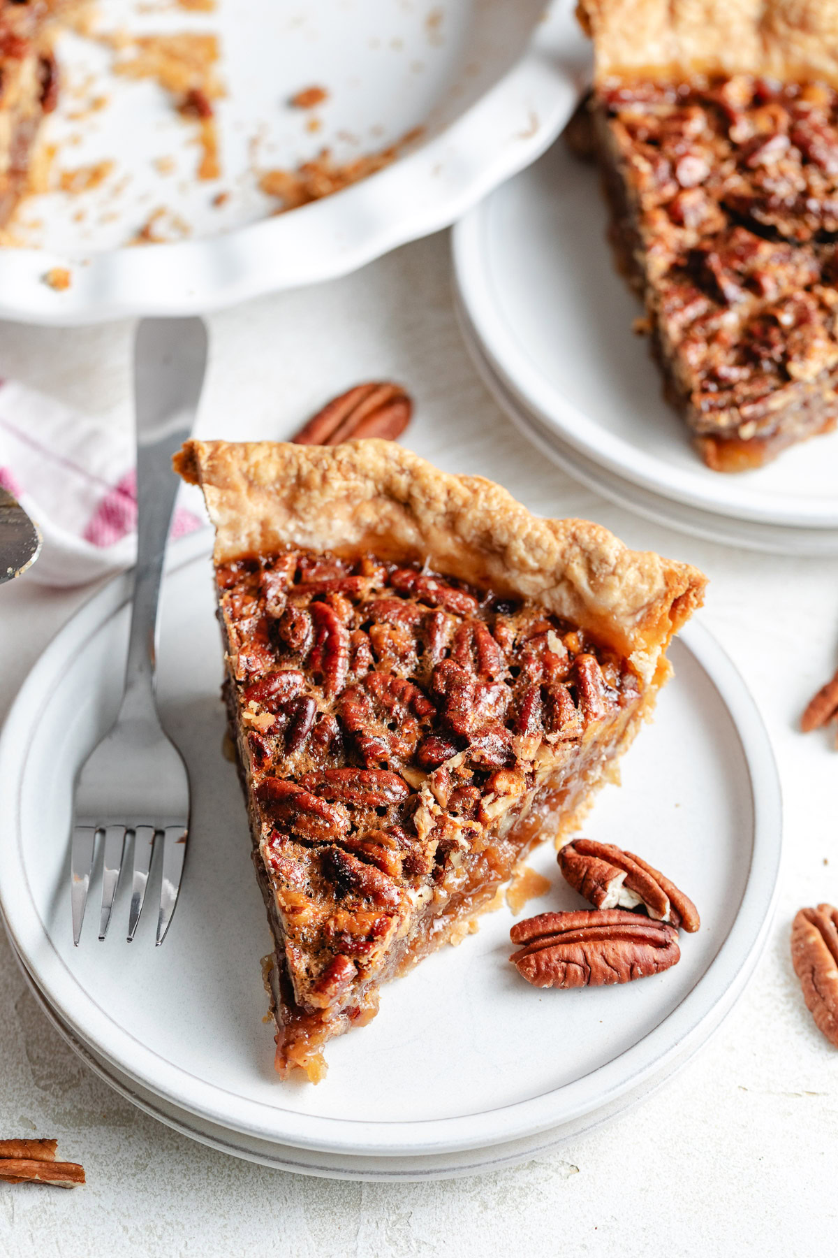 Overhead view of pie slices on plates.