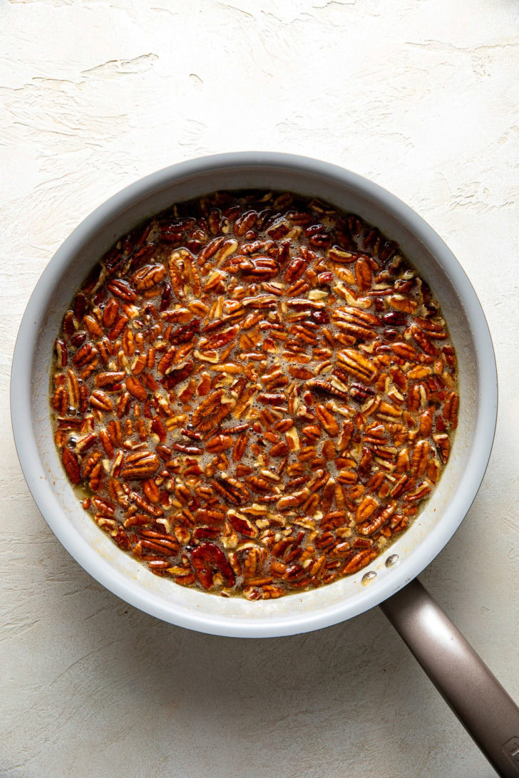Pecan pie filling in a skillet.