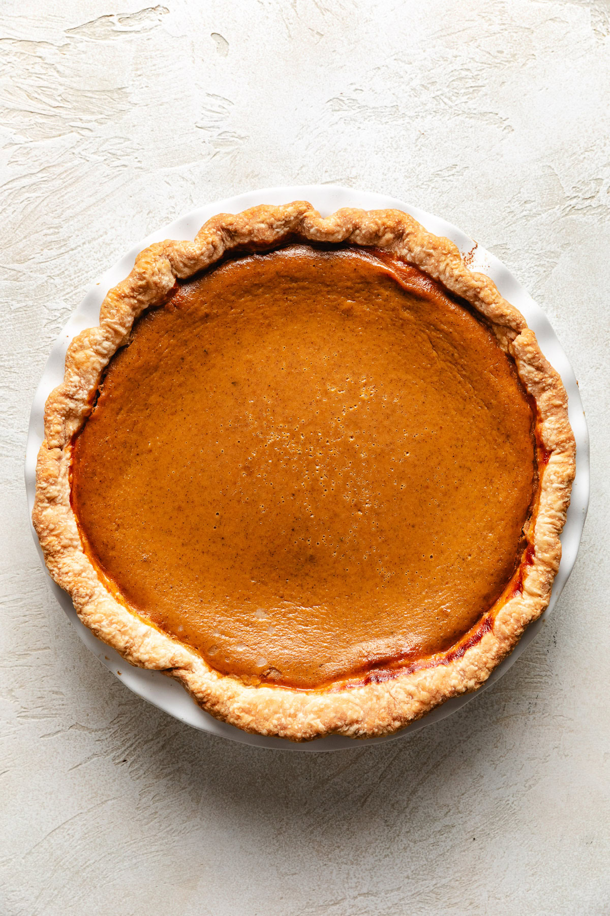 Overhead view of baked pumpkin pie.