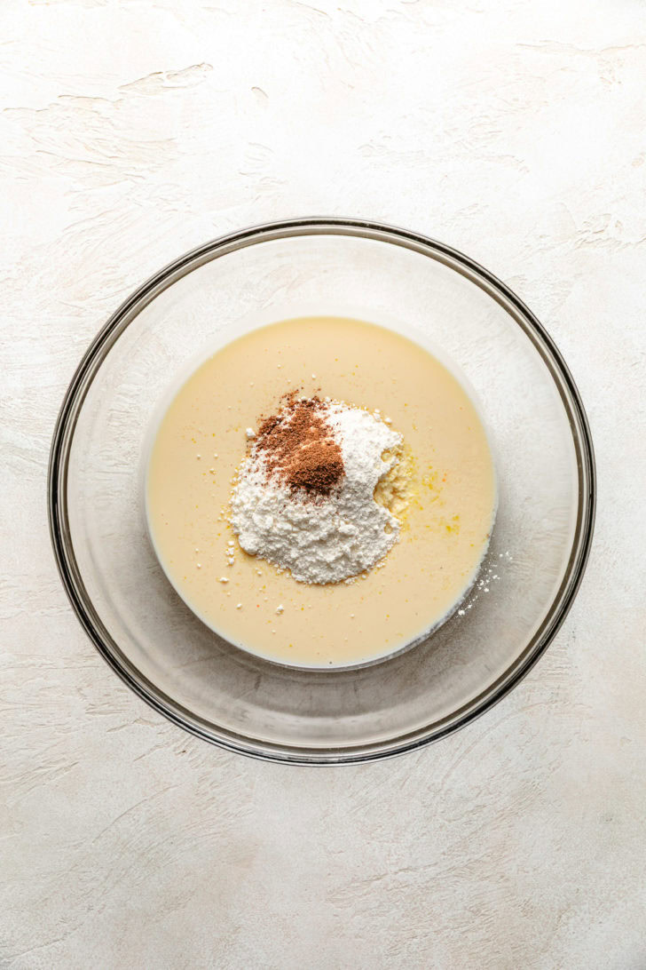 Mixing ingredients for eggnog pie.