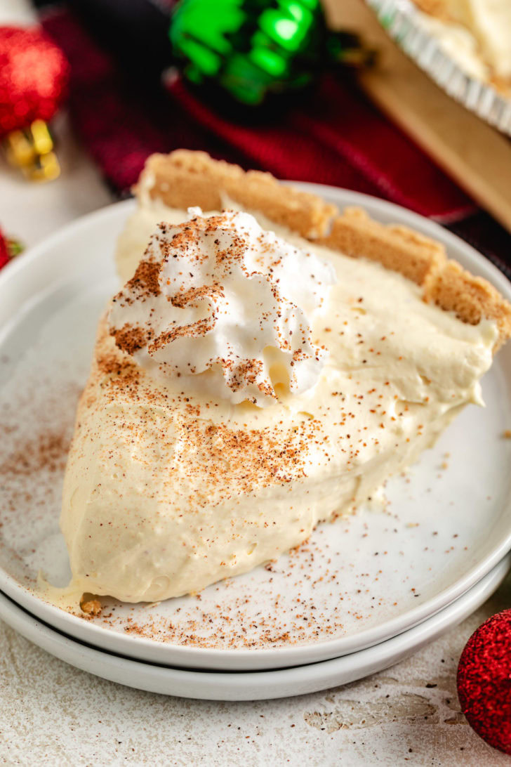 Creamy eggnog pie on a plate.
