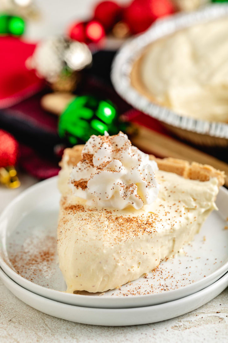 Creamy eggnog pie with whipped topping.