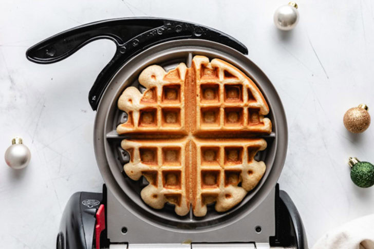 Easiest Eggnog Waffles Waffle in a waffle maker.