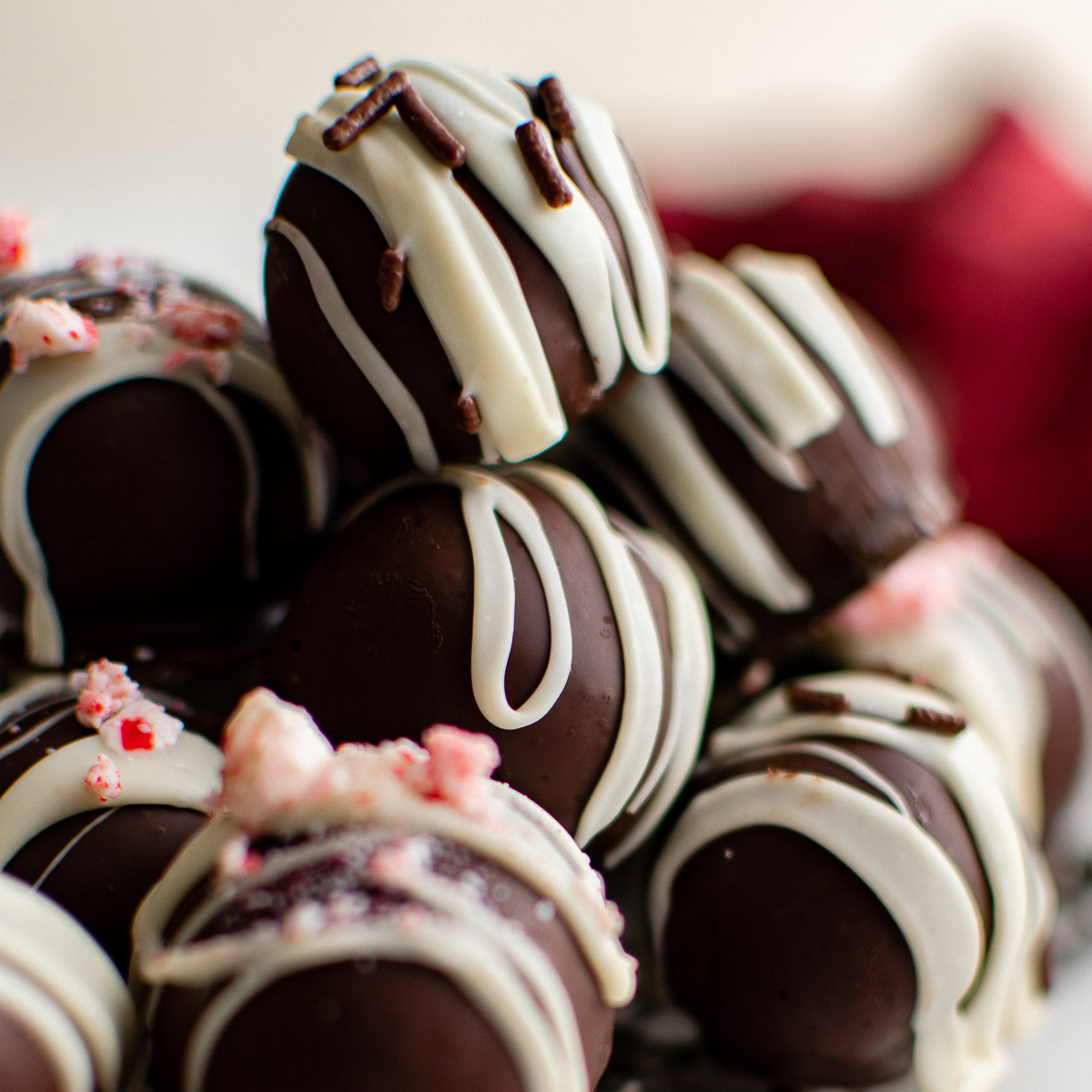 Chocolate truffles with peppermint toppings.