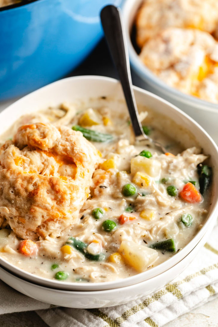 White bowl filled with chicken pot pie soup.