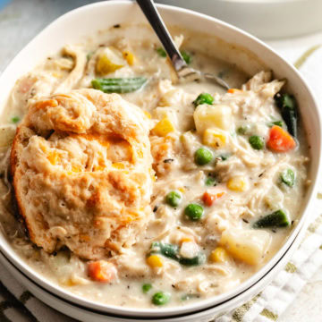 Close up view of a bowl of chicken pot pie soup.