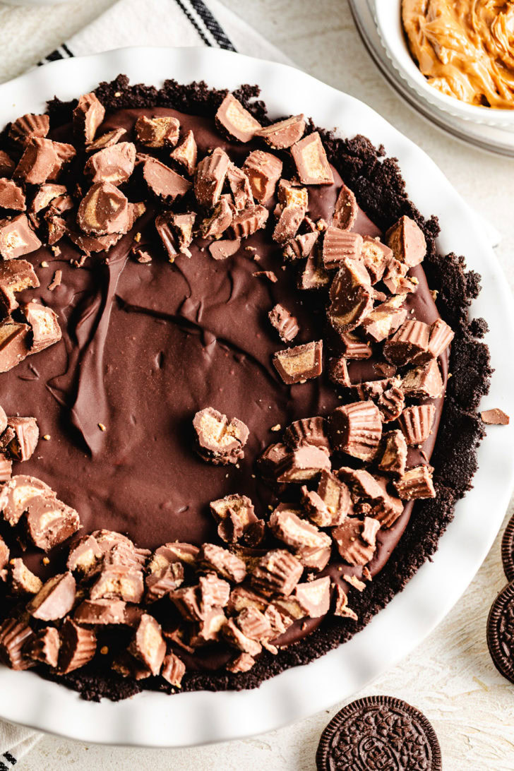 Chocolate pie topped with peanut butter cups.