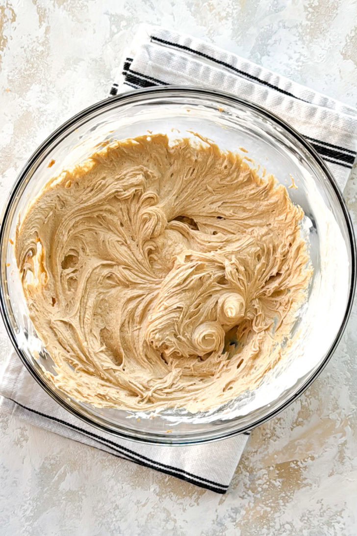 Creamy peanut butter mixture in bowl.