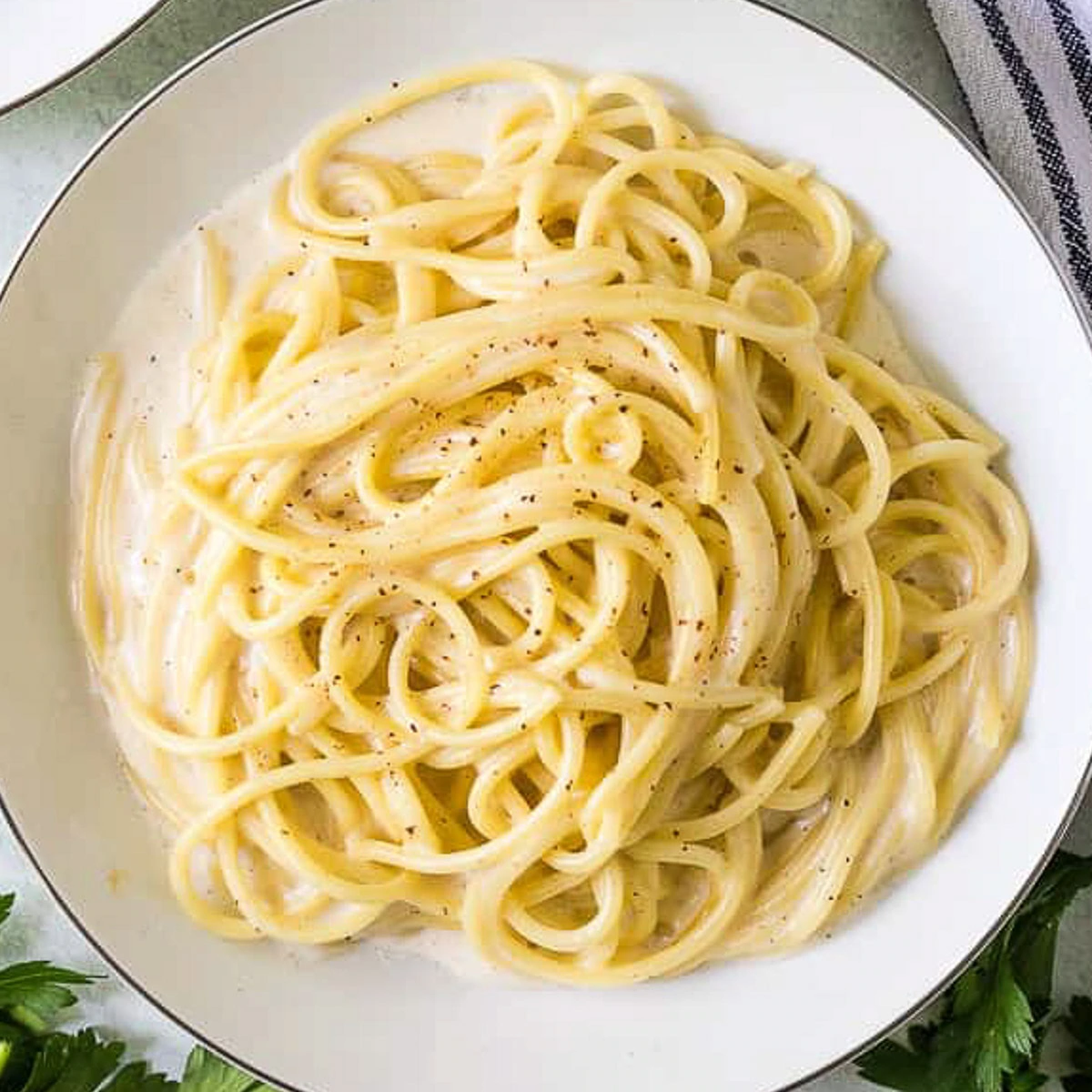 Bechamel sauce with cream over noodles.