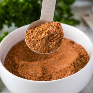 Fajita seasoning recipe on a metal spoon.