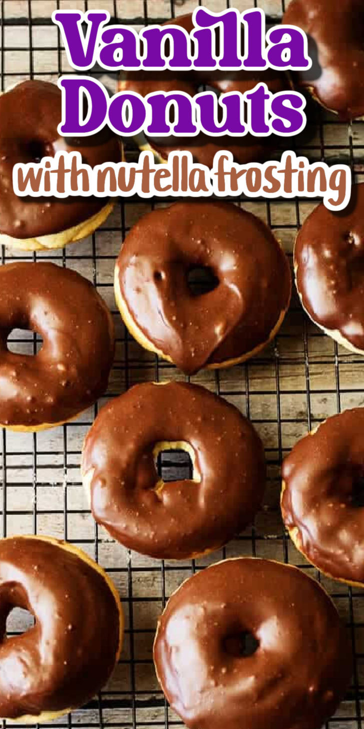 Overhead view of a wire rack filled with vanilla donuts.