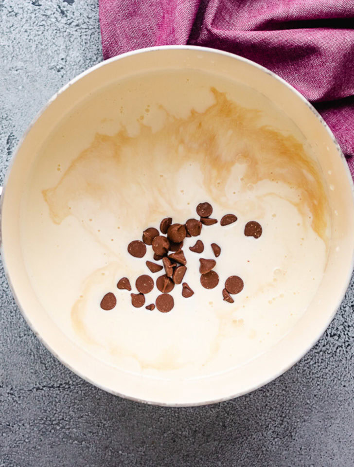 Milk, chocolate chips, and vanilla in a saucepan.