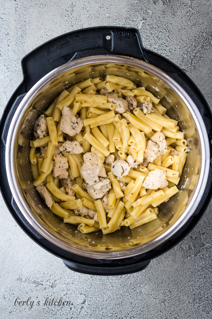 Cooked chicken and noodles in the Instant Pot.