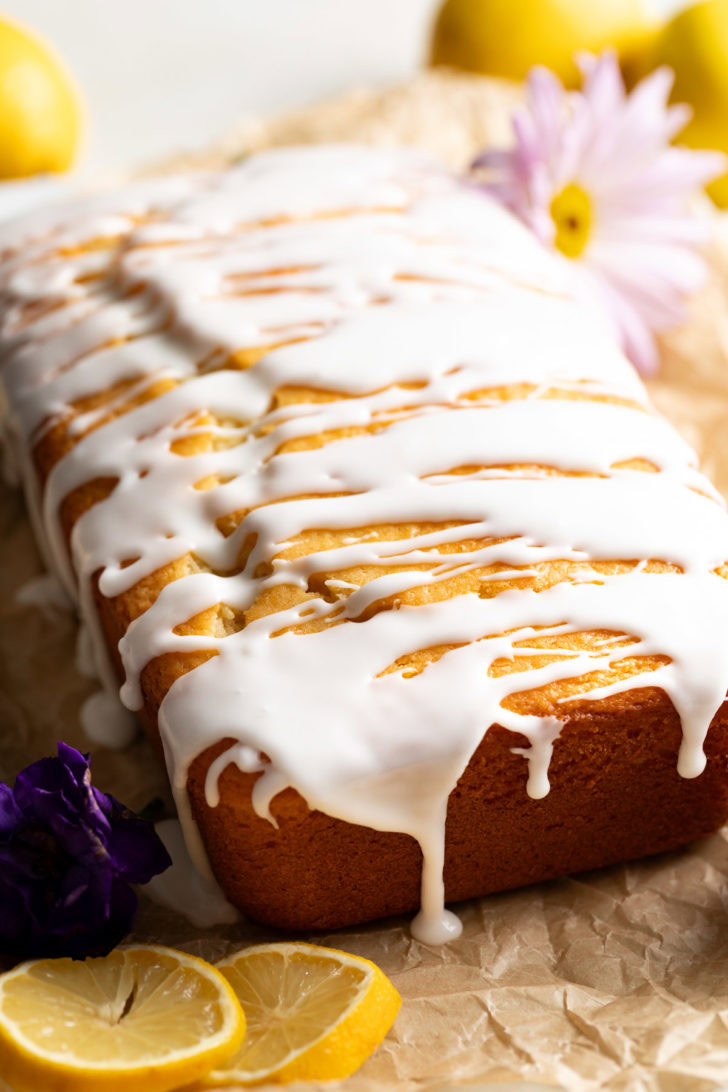 Lemon quick bread on a white platter.