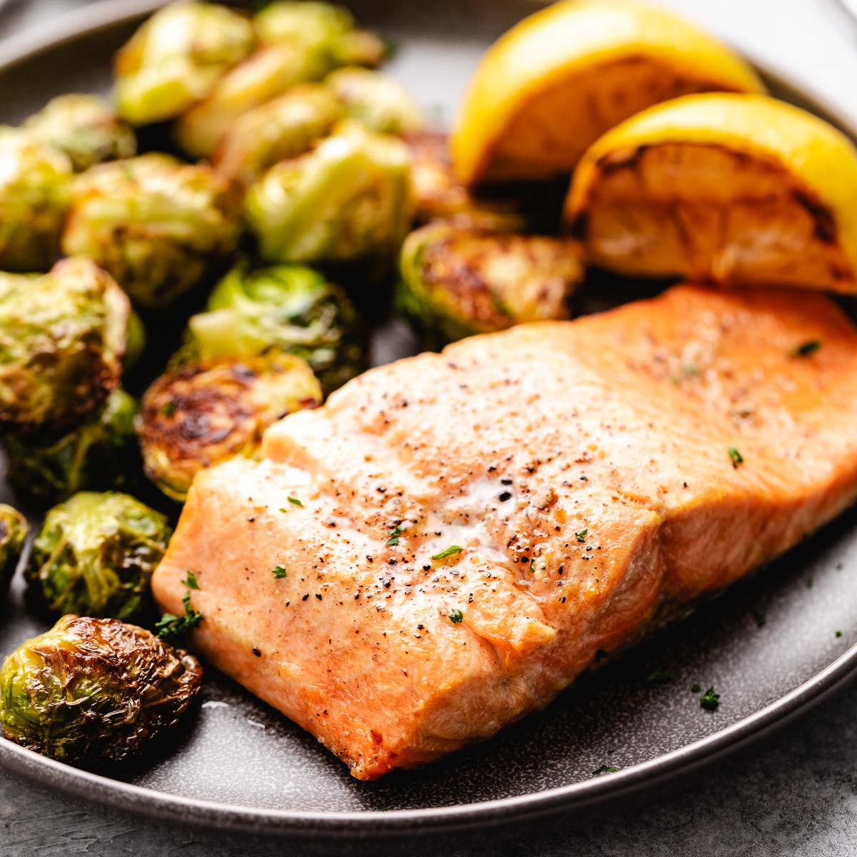 Close up view of air fryer salmon on a plate.