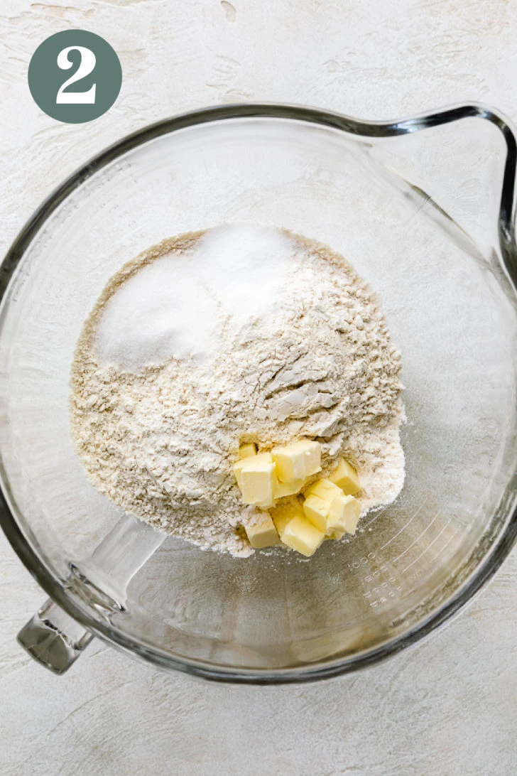Bread flour, all-purpose flour, sugar, salt, and butter in a mixing bowl.