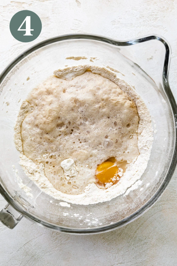 Egg and yeast mixture poured into flour and butter mixture.