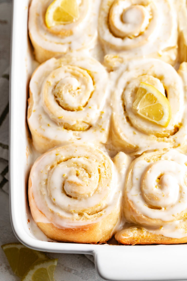 Lemon sweet rolls with citrus garnish.
